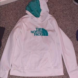 turquoise and white north face sweatshirt